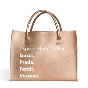 This vegan leather bag holds your laptop, tablet, wallet, phone 17”x12.5”x6.5”